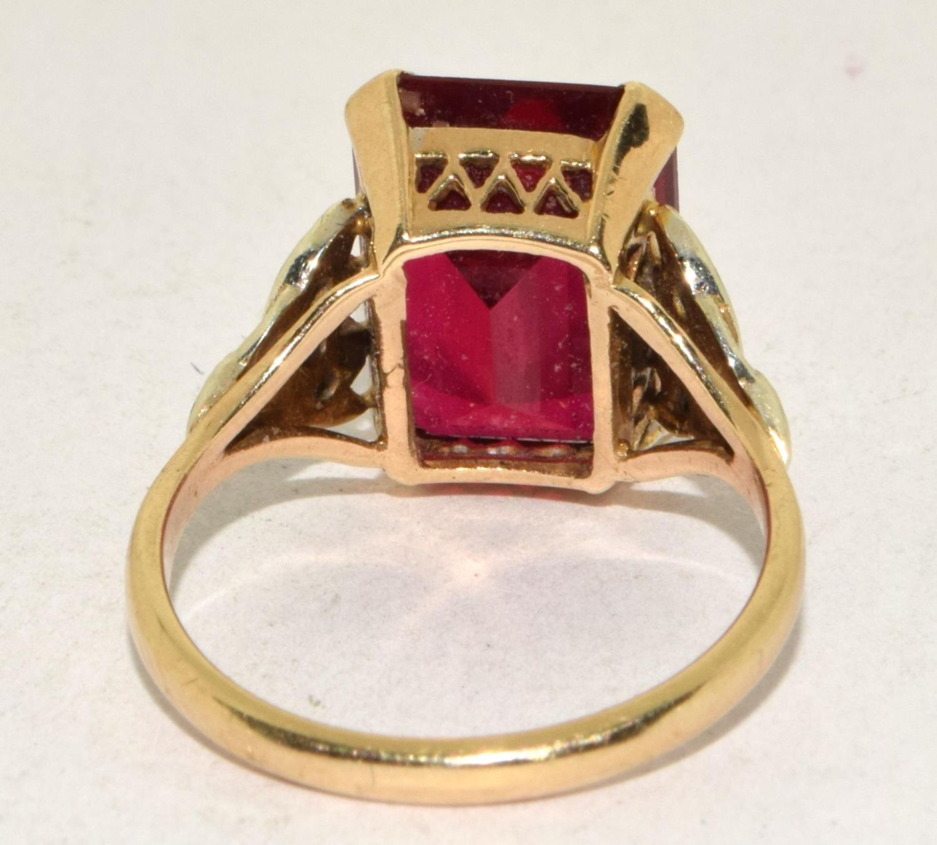 9ct gold ladies Large Ruby square set ring with diamonds to the shank set in an open work setting - Image 3 of 5