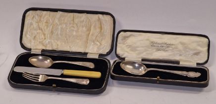 Boxed silver child's cutlery set together a silver spoon boxed