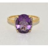 9ct gold ladies Amethyst and Diamond chip shoulder open work ring size R