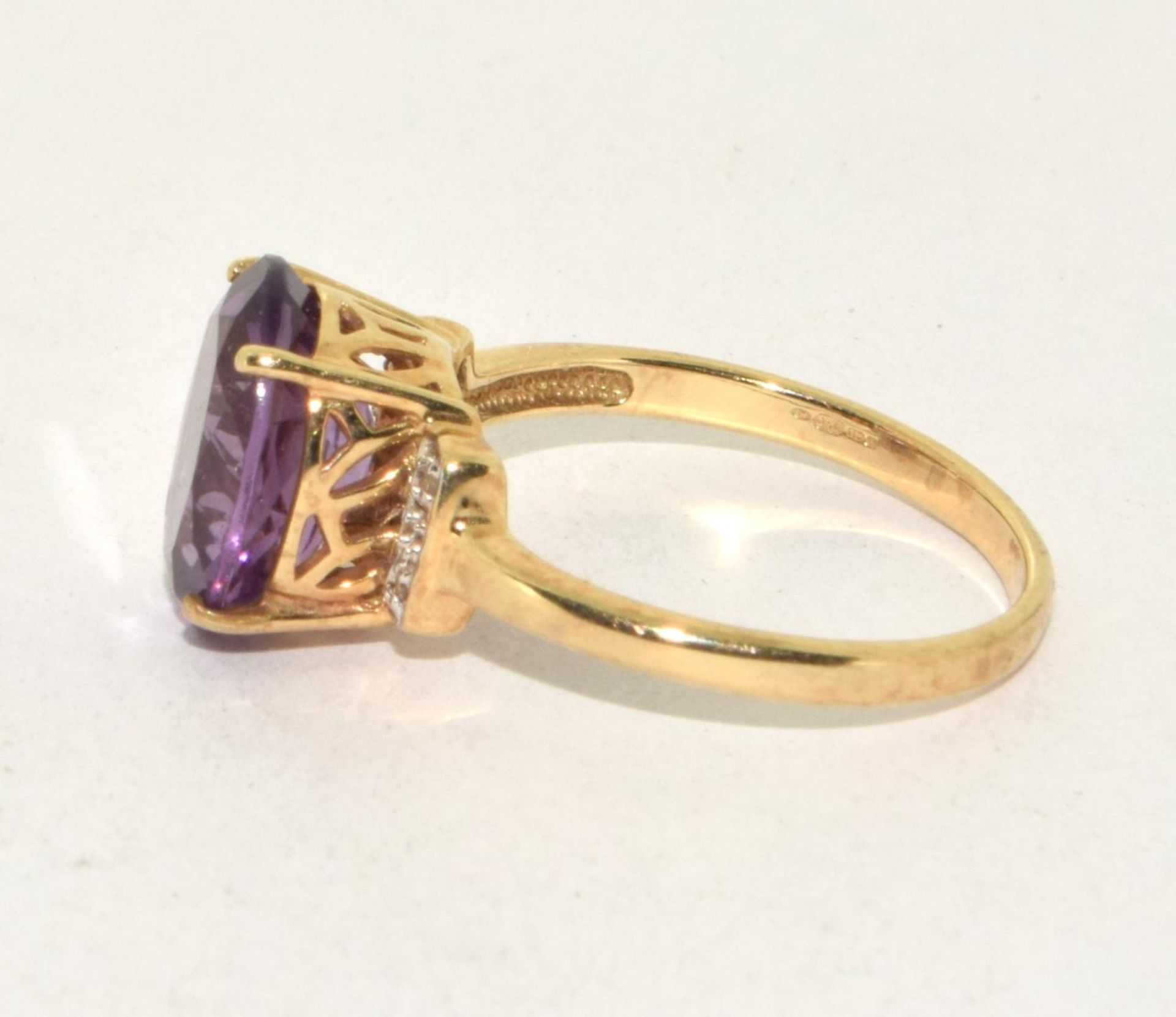 9ct gold ladies Amethyst and Diamond chip shoulder open work ring size R - Image 2 of 5