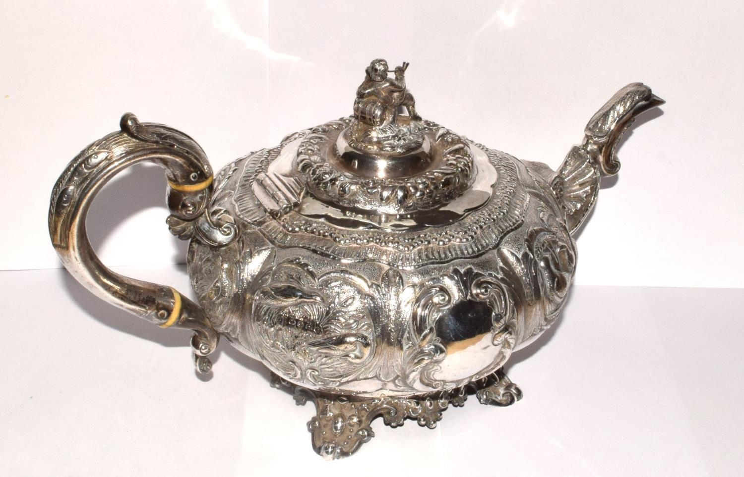 A superb example of a Georgian silver Tea pot heavily embossed with blank cartouche and surmounted - Image 10 of 11