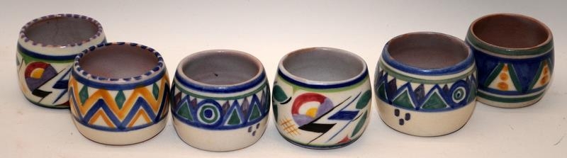 Poole Pottery group of egg cups to include KZ, LD, JV, TQ pattern.