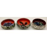 Poole Pottery shape 86 carved Delphis bowl together with two others (3)