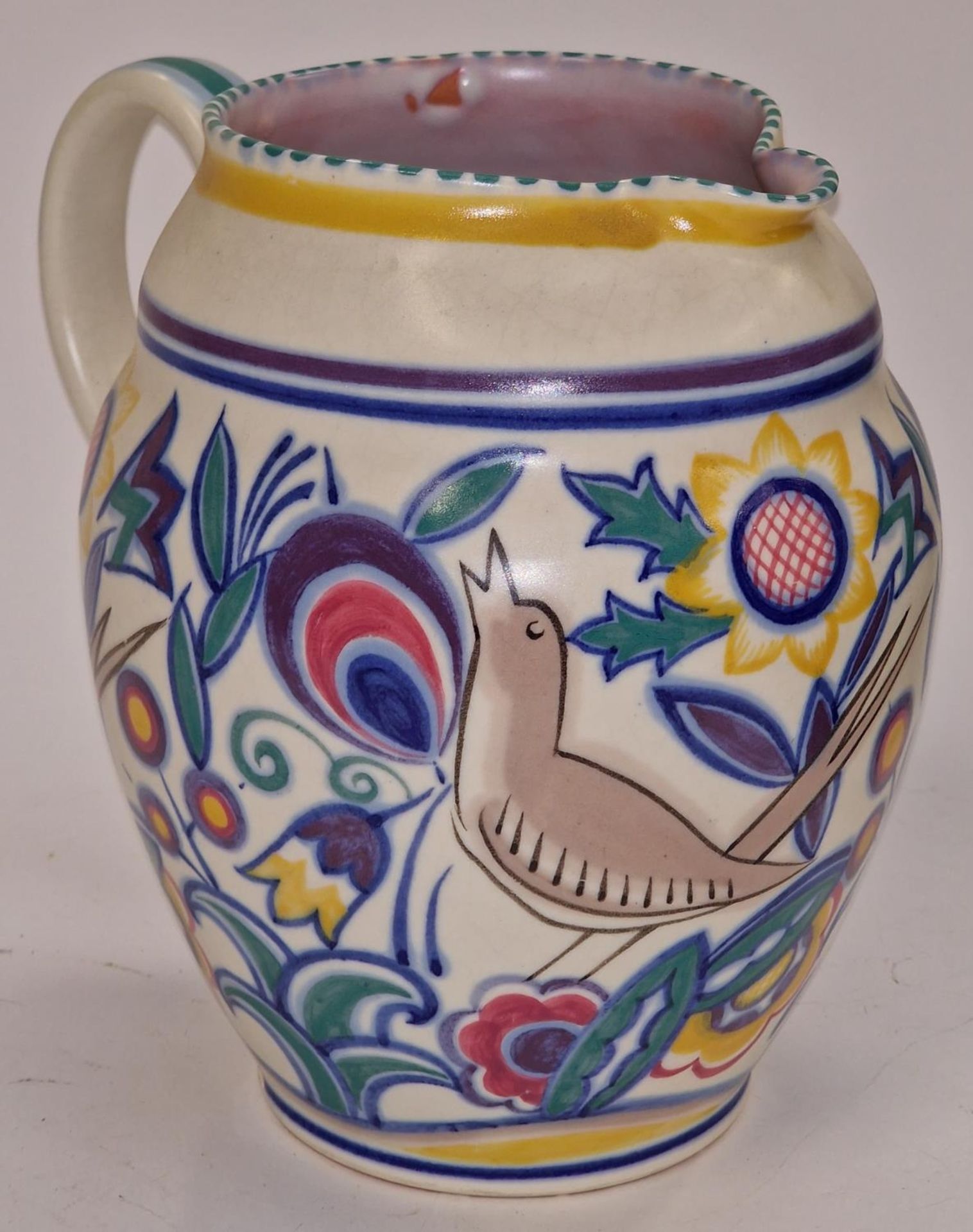 Poole Pottery shape 309 large AS pattern jug decorated by Marjorie Batt 8" high.