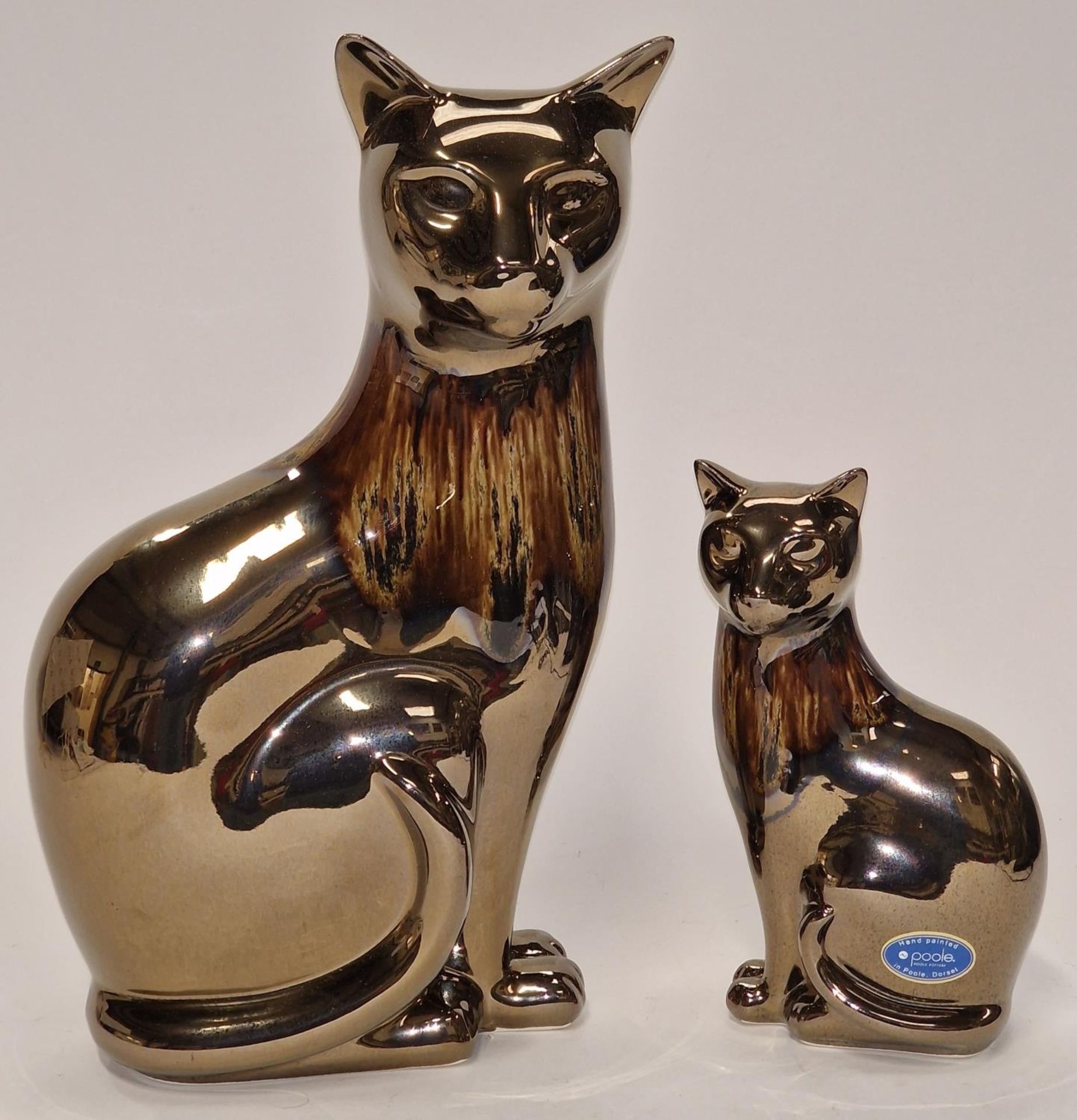 Poole Pottery large precious gold cat together with one smaller (both boxed) (2)