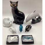 Poole Pottery unusual coloured Dolphin, together with three miniature Dolphins, Seal & small cat,