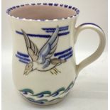 Poole Pottery shape 499 SVV pattern mug depicting a bird in flight over water from a design by