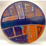 Poole Pottery large 16" charger blue mark with orange peel glaze decorated by either Shirley