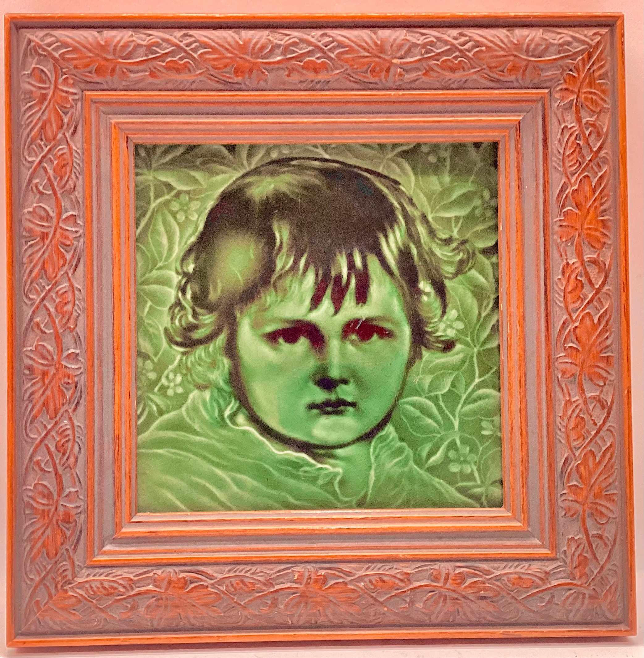 Poole Pottery Carter & Co framed tile depicting a young child 9"