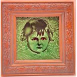 Poole Pottery Carter & Co framed tile depicting a young child 9"