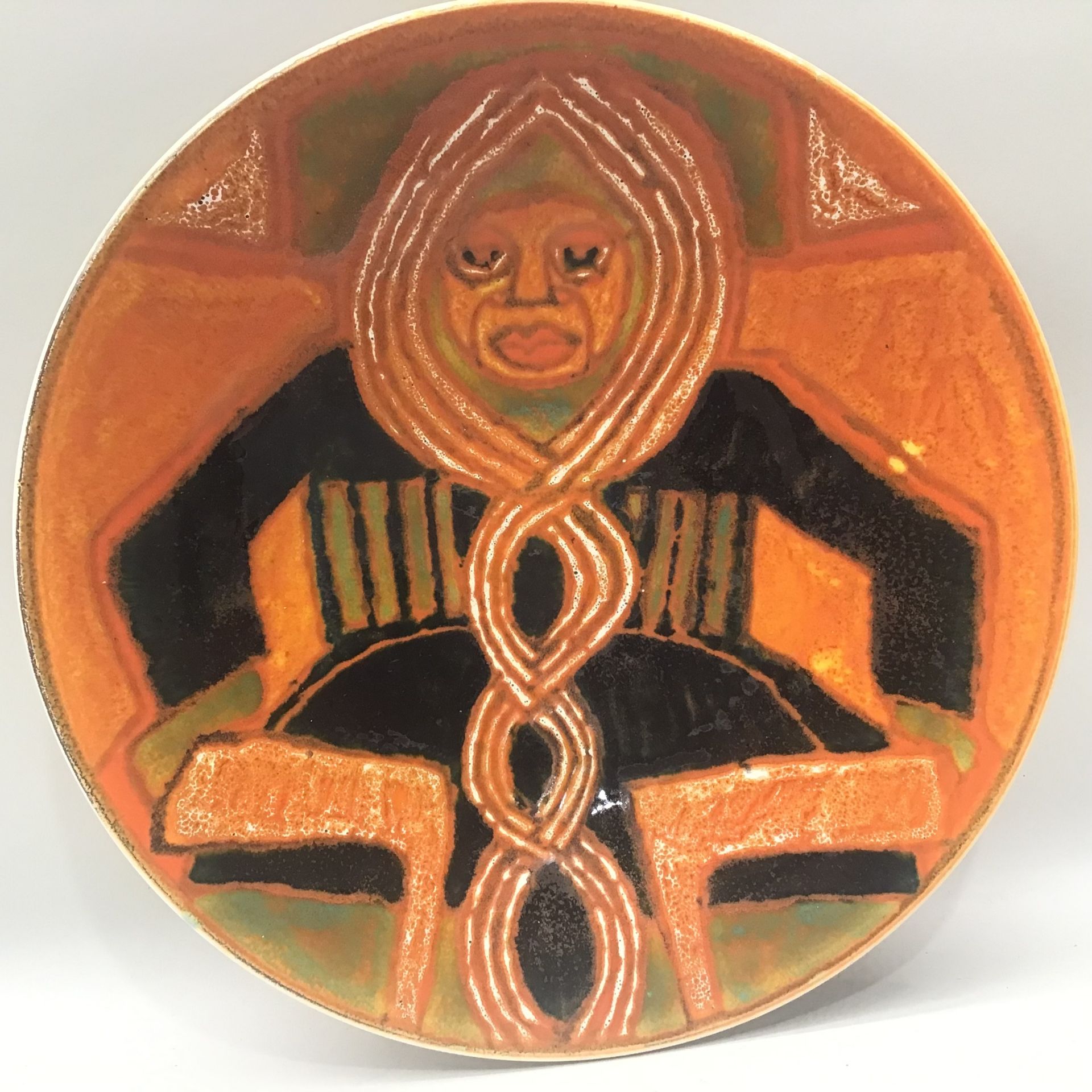 Poole Pottery unusual studio charger phase 2 mark no 46, 1964-1966 depicting a male figure, possibly