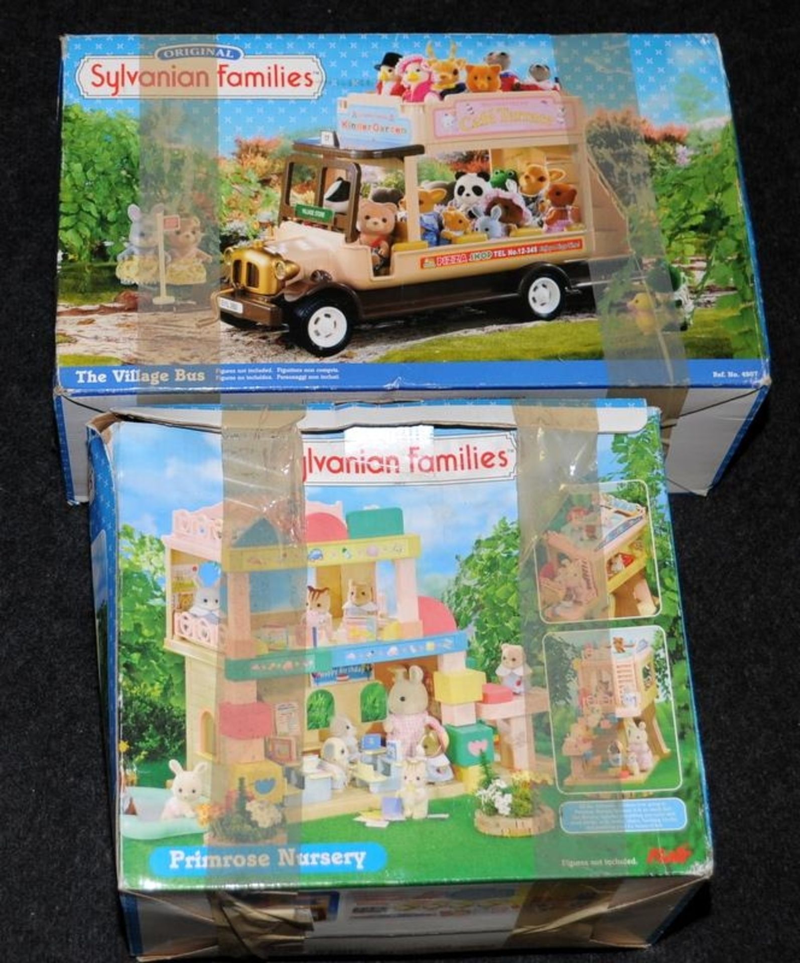 A collection of Sylvanian Families contained within two boxes. Not checked for completeness