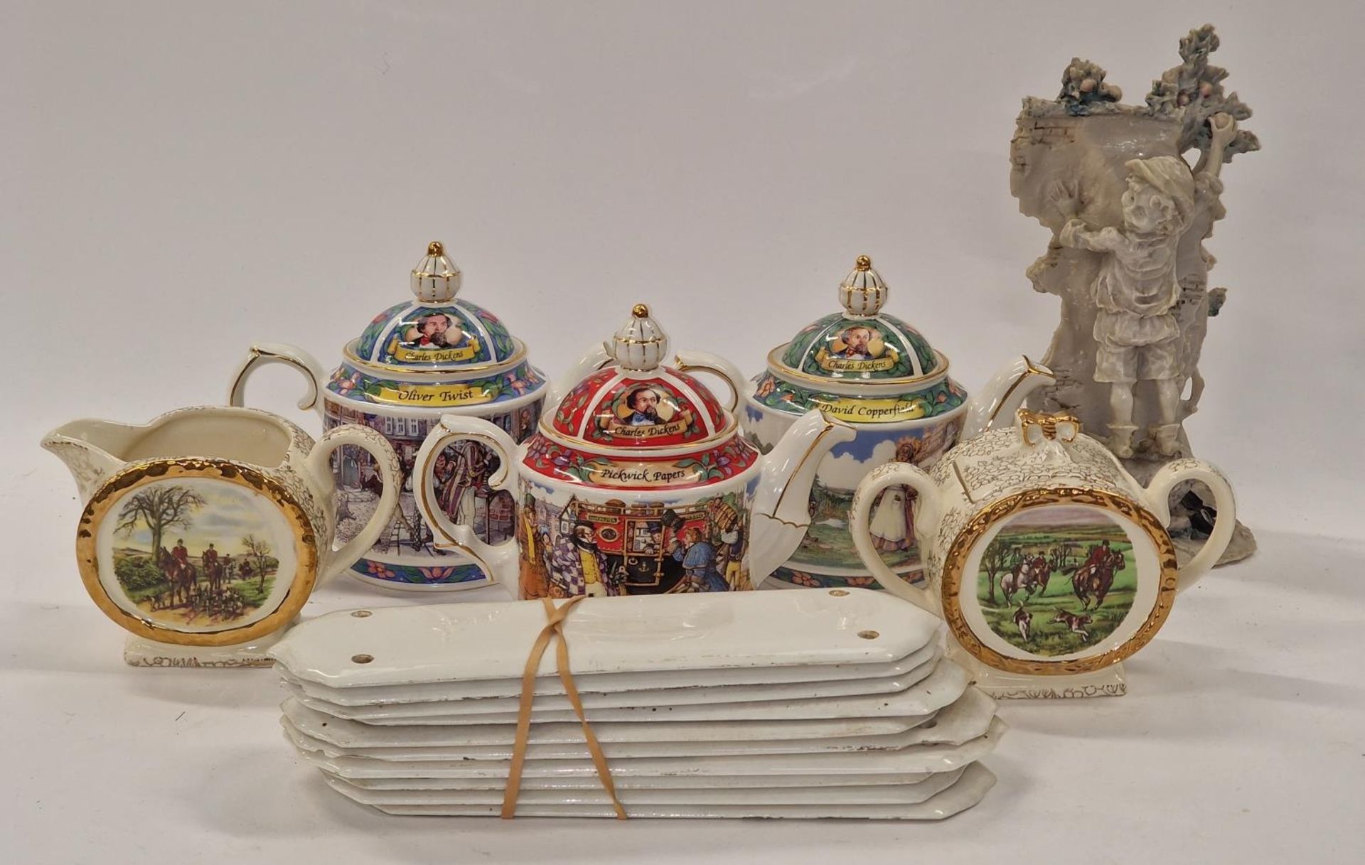 Collection of Sadler ceramic tea pots together with other items to include door plates.