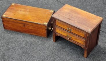 A vintage mahogany writing slope together with a miniature set of drawers.