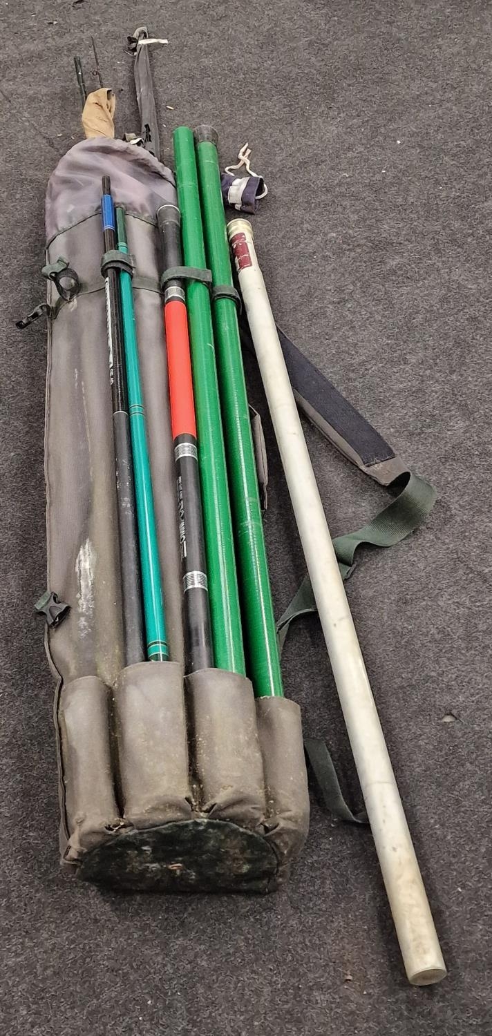 A collection of fishing rods and equipment. Good lot to sort through.