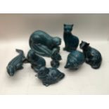 8 blue glazed Poole pottery animals.