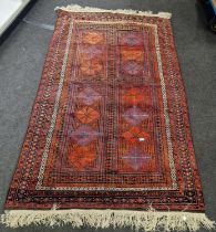 A vintage maroon afghan rug 223x140cm