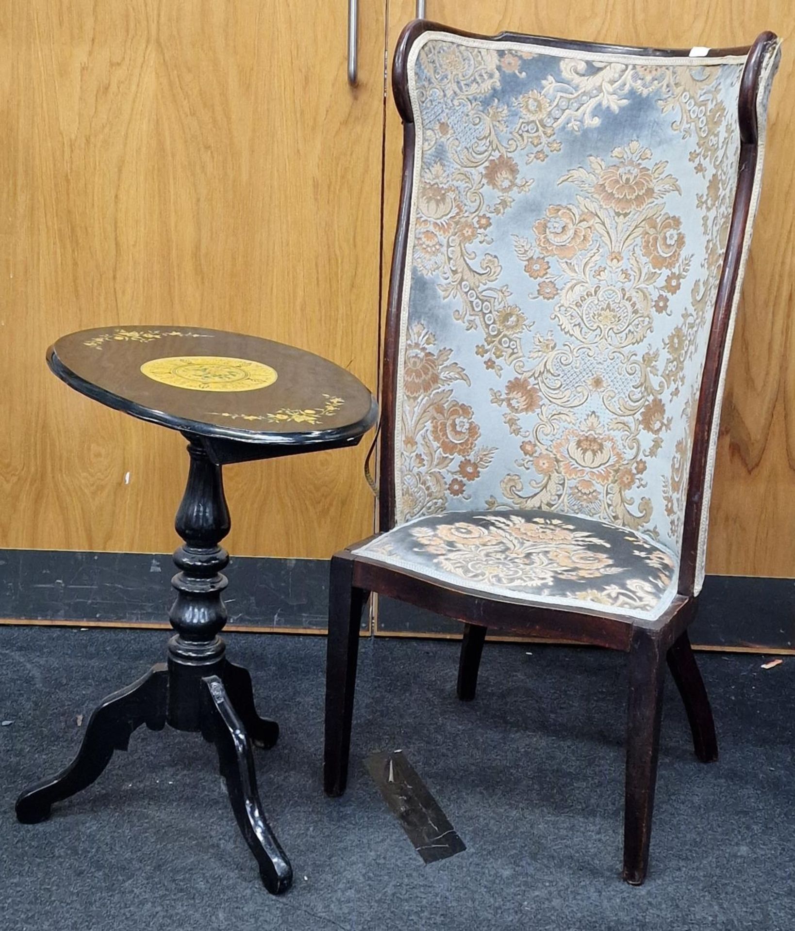 Antique mahogany framed upholstered bucket back chair together with an ebonised tilt top wine