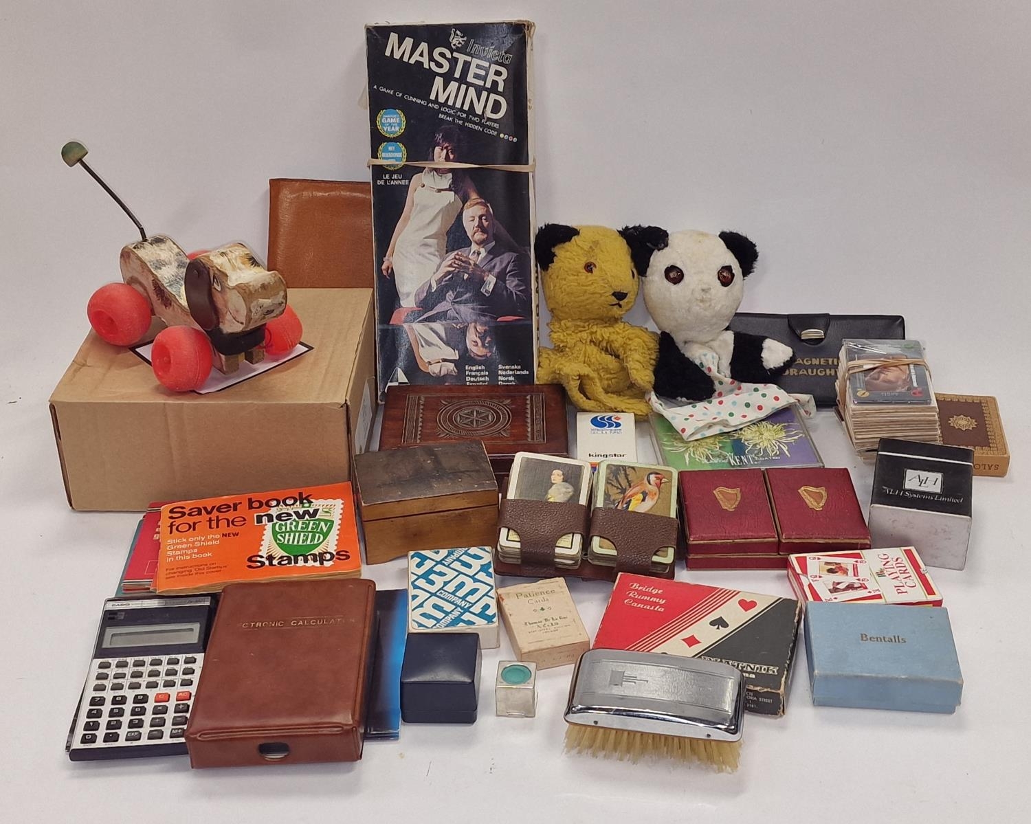 Mixed collectables to include large quantity of playing cards, vintage toys and other curios.