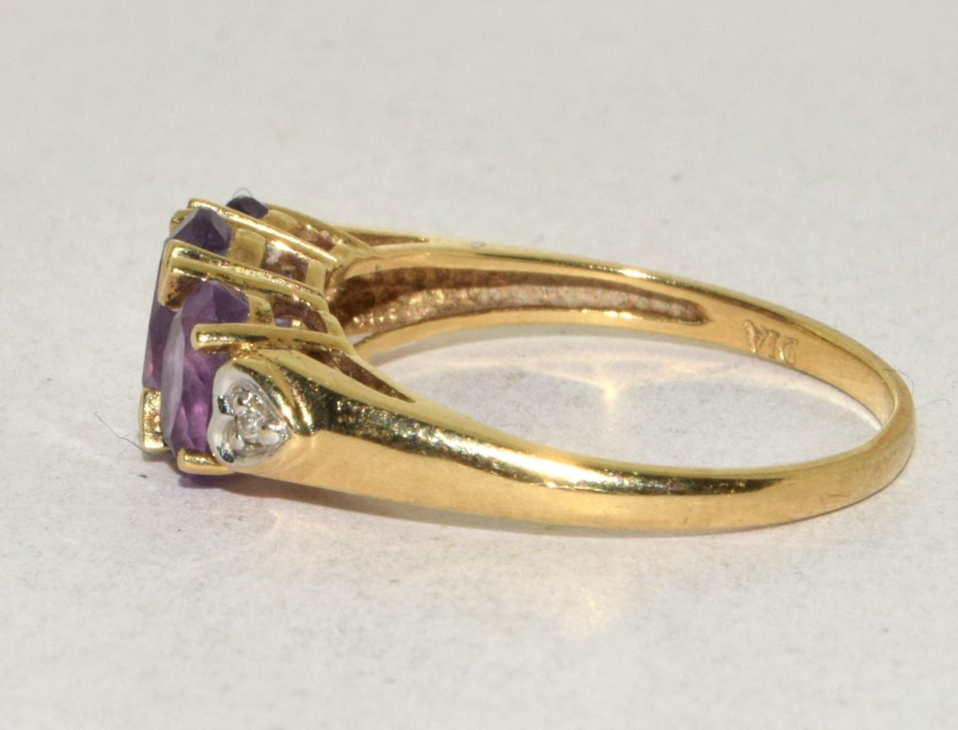9ct gold ladies Diamond and Amethyst ring hallmarked as Diamond in the ring 2.2g size O - Image 2 of 5