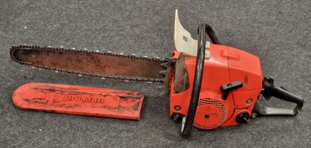 Dolmar petrol powered chainsaw.