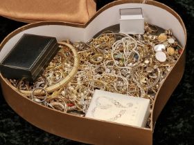 A box of costume jewellery to include gold and silver.