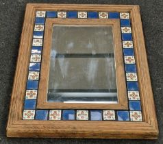 Vintage oak framed wall mirror with decorative blue and white tiled border 86x65cm.