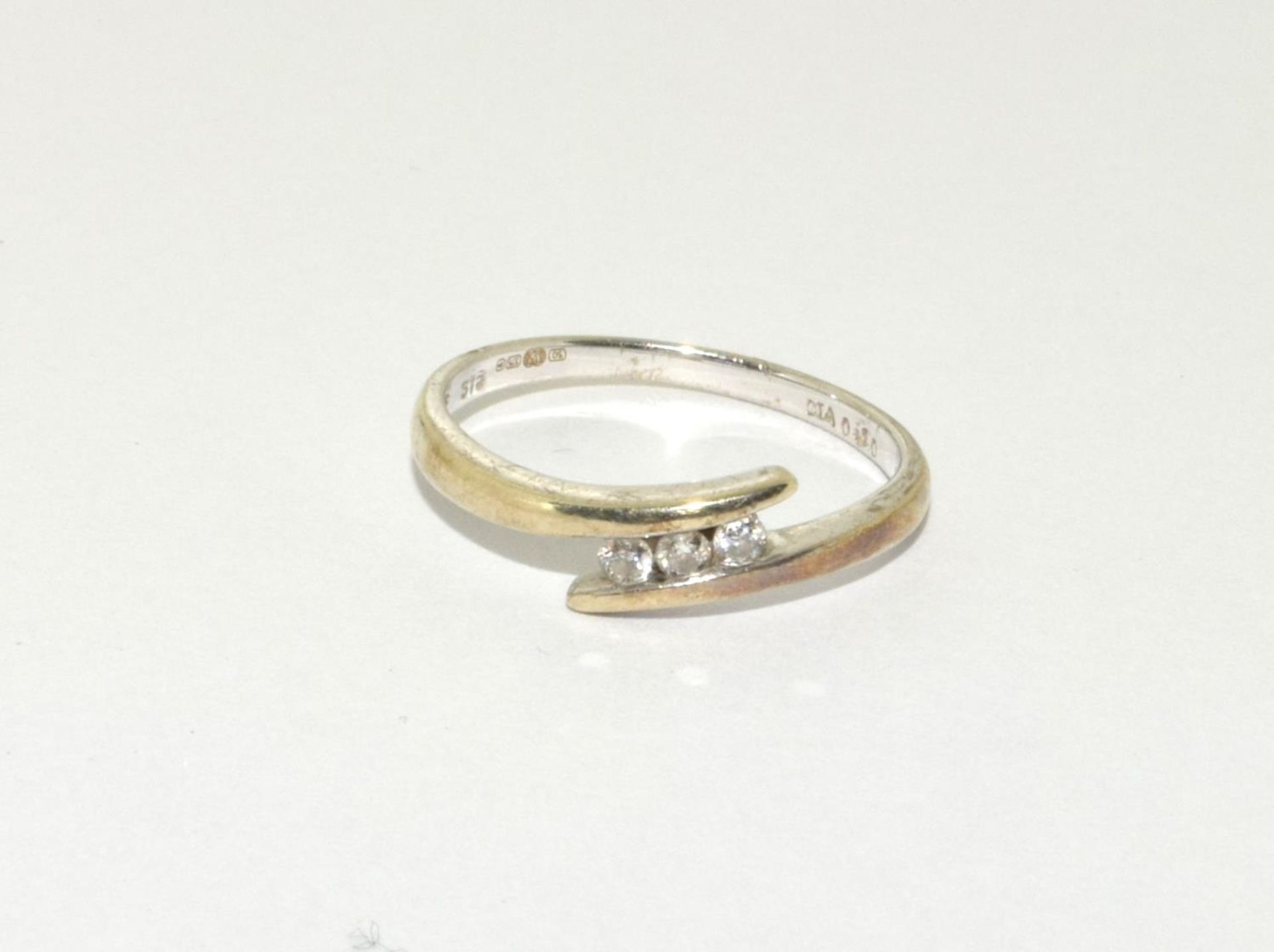Diamond 3 stone 9ct gold ring Size O.