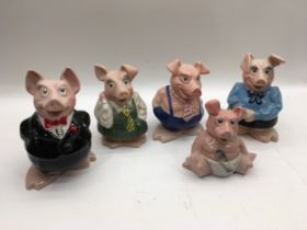 A set of five Wade NatWest piggy banks.