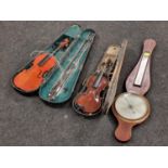 Two violins both with cases together with a vintage wall barometer.