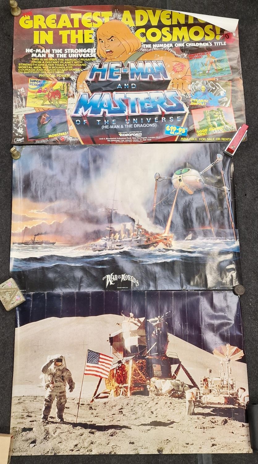 Three vintage rolled wall posters to include: He-Man and the Masters, War of the Worlds and the