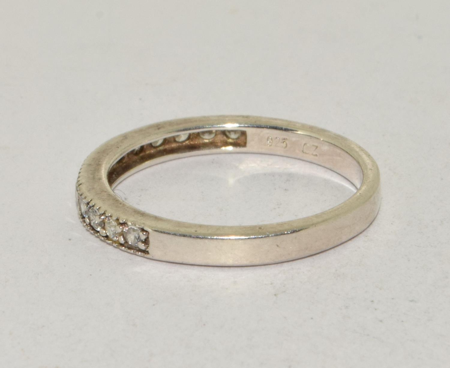 A 925 silver and CZ half eternity band. Size Q - Image 2 of 3