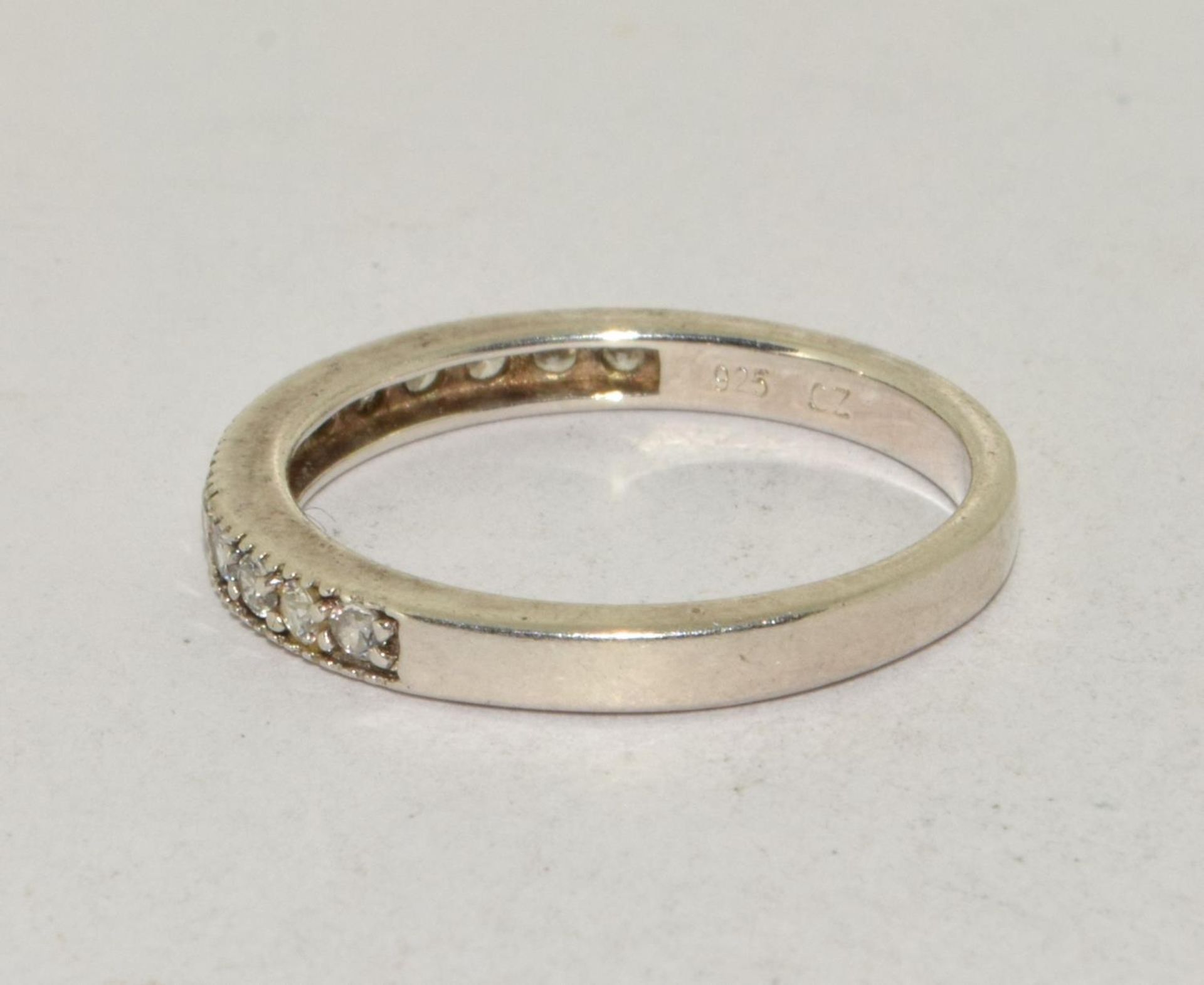 A 925 silver and CZ half eternity band. Size Q - Image 2 of 3