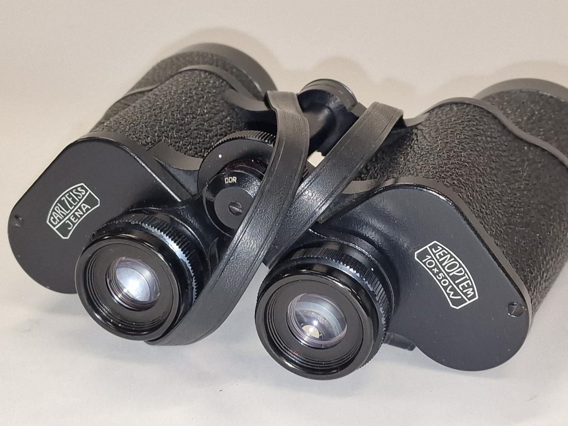 A pair of Carl Zeiss Jenoptem 10x50 binoculars with original case. - Image 3 of 3