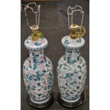 Pair of large Oriental bulbous shape patterned lamps on wooden bases. Each approx 80cm tall.