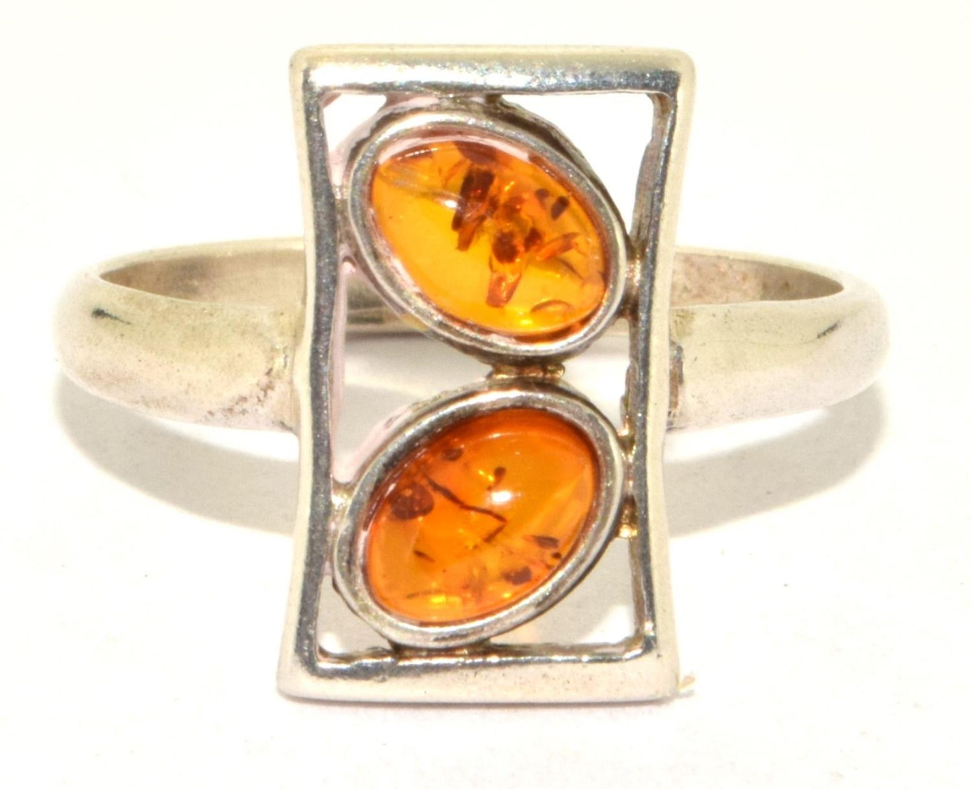 A 925 silver and amber ring Size O
