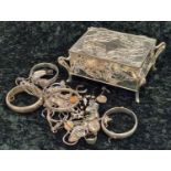 A collection of silver jewellery in a silver plated jewellery box.