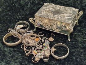 A collection of silver jewellery in a silver plated jewellery box.