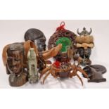 Collection of assorted wooden sculptures and other items.