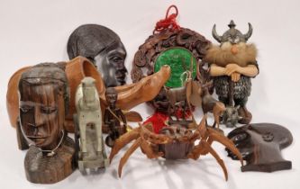 Collection of assorted wooden sculptures and other items.