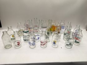 25 glass advertising bottles.