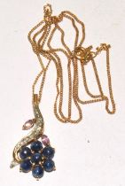 9ct gold pendant necklace in a flower design with Pink and Blue sapphires and Diamond decoration