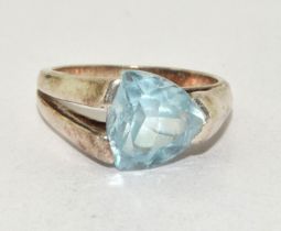 A 925 silver and blue topaz ring Size N