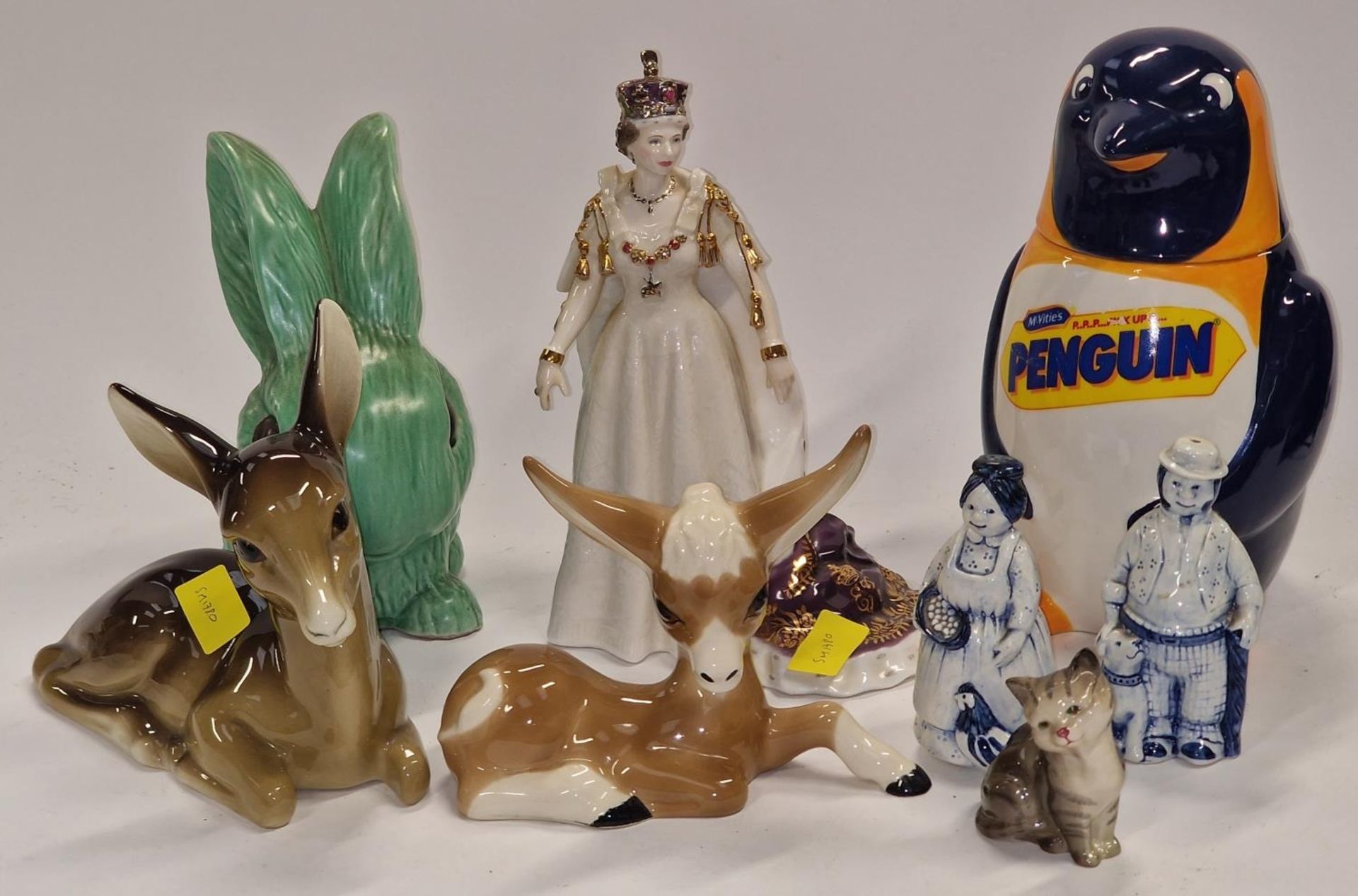 Collection of ceramic ornaments to include Royal Worcester Queen Elizabeth II, Beswick cat, large