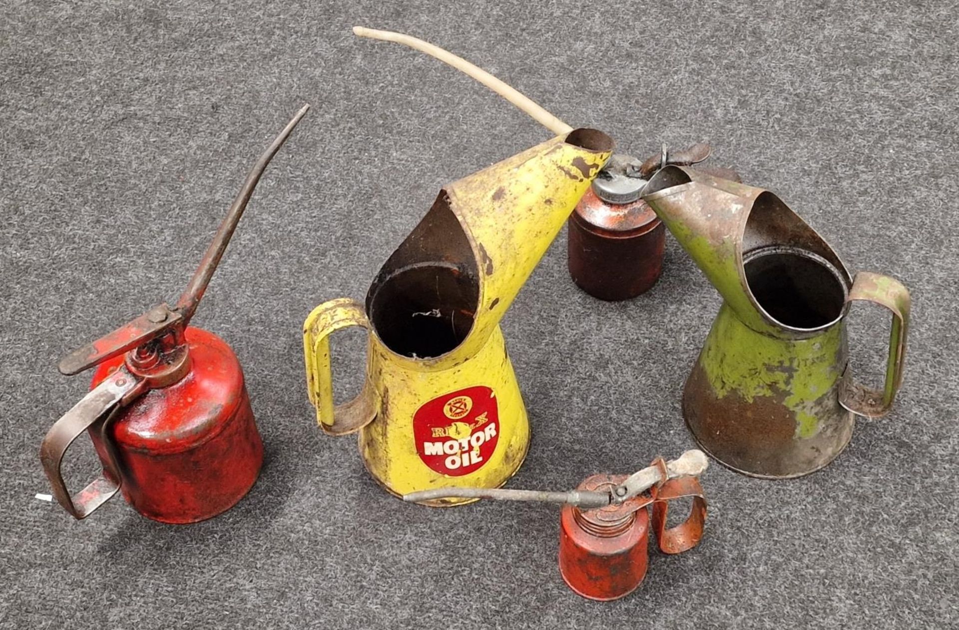 Collection of vintage oil cans.