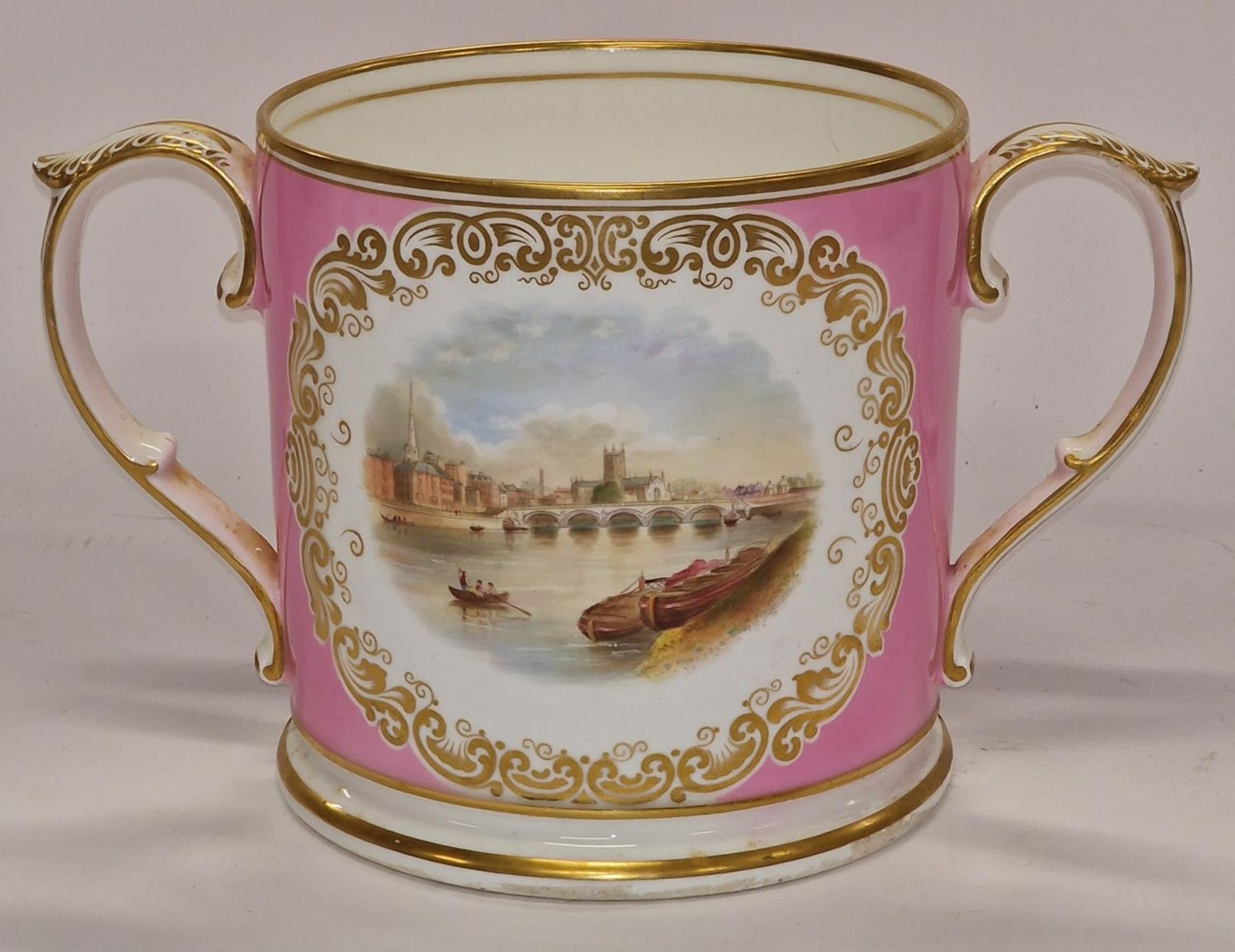 A Grainger & Co of Worcester large hand painted twin handled loving cup.