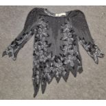 A 1960's Blacktie ladies flapper dress size 16.