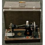 Vintage Singer sewing machine in original case.