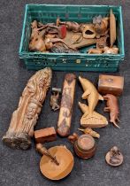 Collection of carved wooden figurines of animals etc together with some treen.