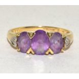 9ct gold ladies Diamond and Amethyst ring hallmarked as Diamond in the ring 2.2g size O